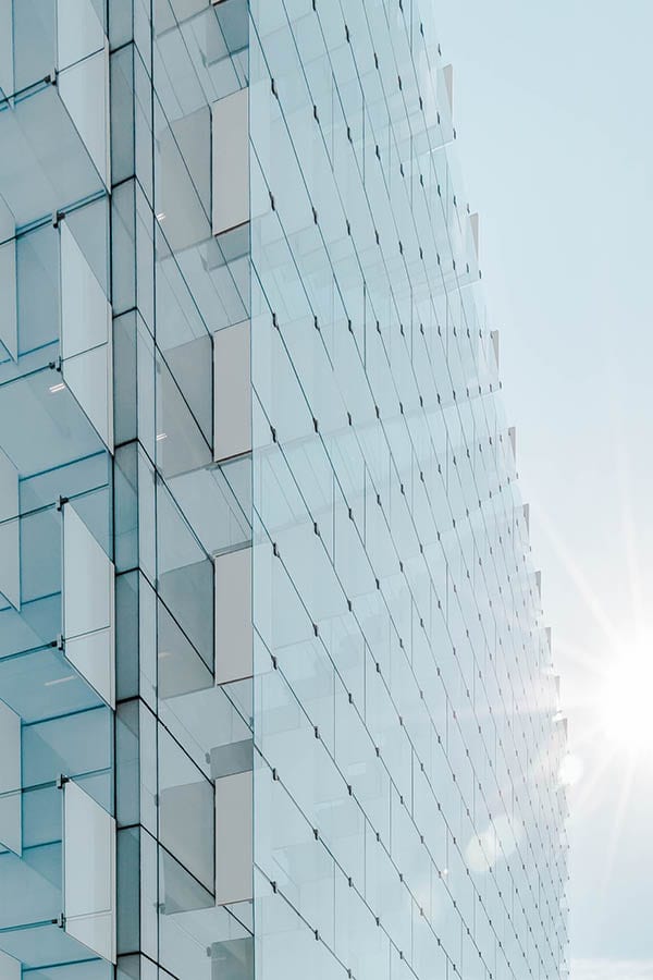 glass building and sun