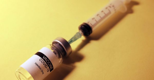 vaccine and syringe